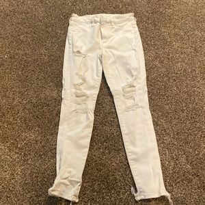 AE White Next Level Stretch Jeans with rips